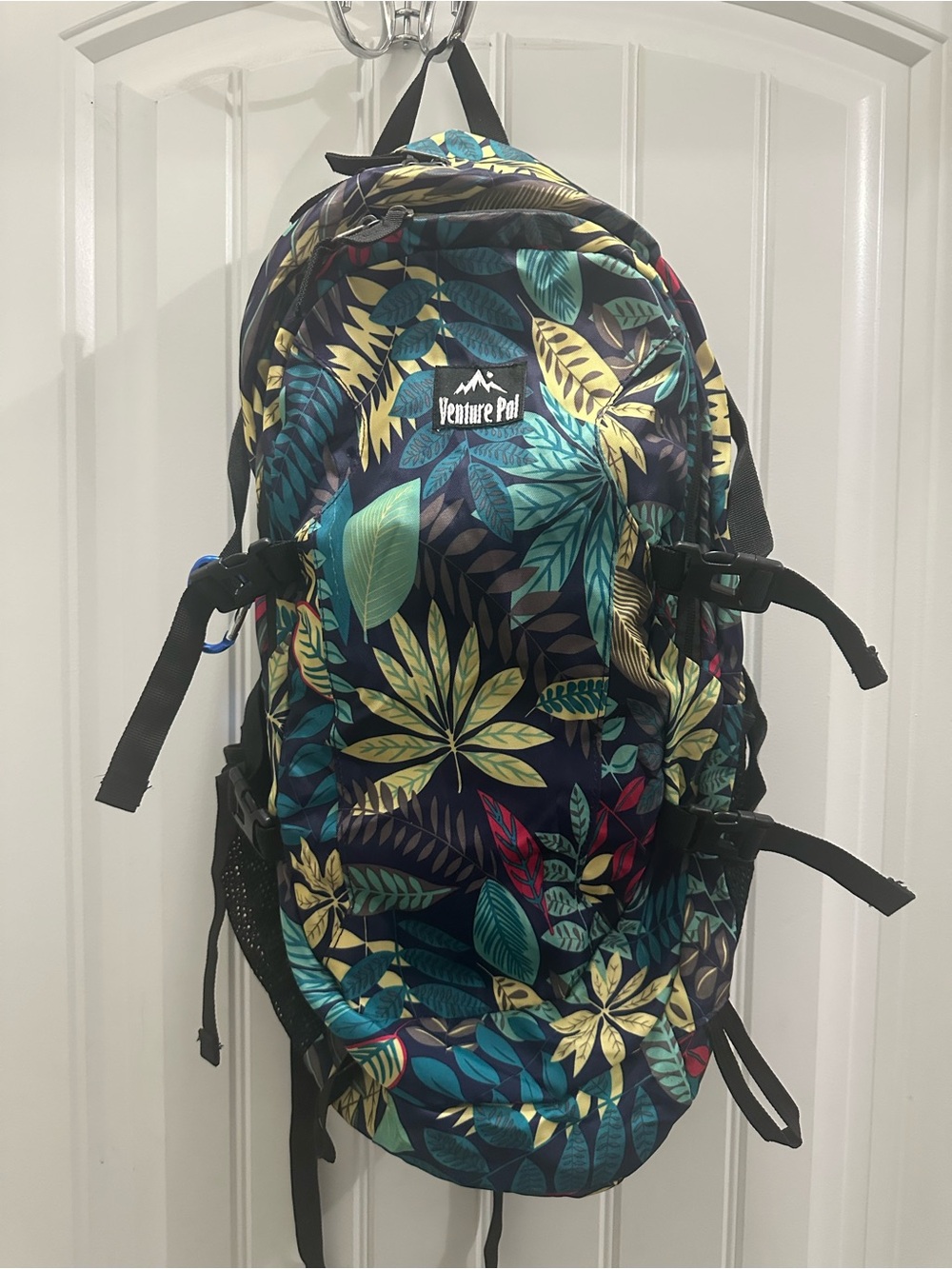 Venture Pal Tropical Leaf Print women’s travel and hiking Backpack - Navy/Green.